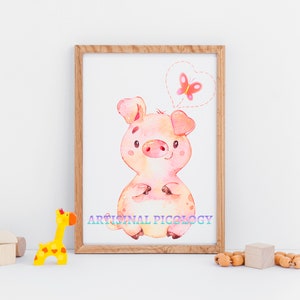 May include: A watercolor illustration of a pink pig with a butterfly in a heart-shaped thought bubble. The illustration is framed in a light wood frame.