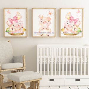 May include: Three watercolor paintings of pink pigs with bows and butterflies. Each pig is sitting in a nest of corn. The paintings are framed in wood and have a white background.