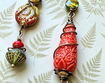 Victorian Style Rainforest Asymmetrical Earrings: Red, Green Glass Beads, Aged Brass Frog Charm