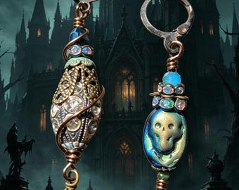 Victorian Gothic Skull Earrings: Blue Black Glass Beads, Aged Brass, Asymmetrical Design