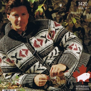 May include: A man wearing a grey and white patterned sweater with red accents. The sweater is made of unspun wool and has a Canadian buffalo logo. The text "White Buffalo The Canadian Yarn" and "1420 VOL. 4" is printed on the image.