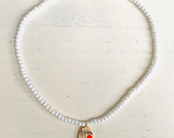 White seed bead 16” choker with 24Kt gold plated brass leaf charm and neon orange enamel