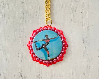 Badge pendant, Grace Jones, repurposed necklace, icon