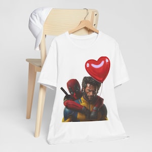 Camiseta unisex con cuello redondo y divertida camiseta de cómic de Deadpool y Wolverine imagen 1