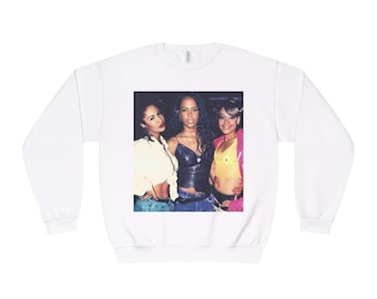 Sudadera unisex de cuello redondo con Selena, Aaliyah y Lisa de Ojo Izquierdo