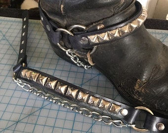 Pair of one row pyramid studded bootstraps