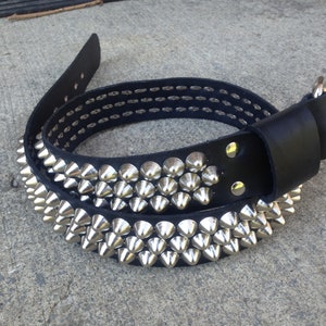 Three row cone studded belt staggered