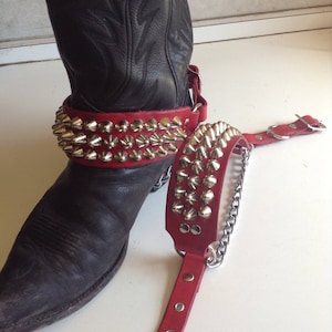 Pair of red three row studded bootstraps