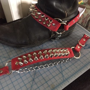 Pair of red leather two row tall cone bootstraps