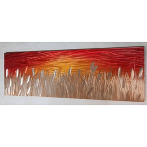 Modern, abstract metal wall art,  3D effect, by R Toomer Art. Titled Sunset by the lake. Indoor/Outdoor. Red, orange and golden brown silver