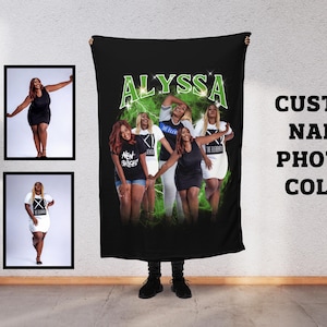 May include: Black blanket featuring a group photo with the name "Alyssa" in green lettering. The blanket has a green background and the text "CUSTOM NAME PHOTOS COLOR" is on the right side. Two framed photos are on the left.