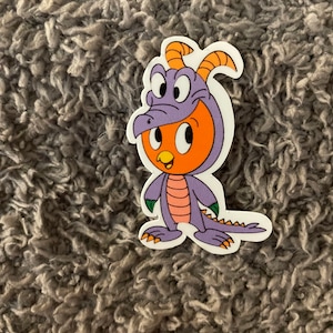 Figment waterproof sticker.  Disney. Orange bird.  Disney orange bird.  Disney figment.