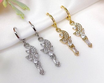 Rhodium or gold plated angel moon wand charm earrings with cubic zirconia cz accents and mini huggie hoops, trendy, y2k