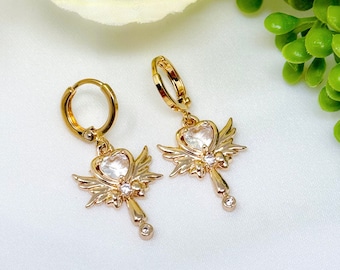 Gold plated angel wings heart wand charm earrings with cubic zirconia cz accents and gold plated mini huggie hoops
