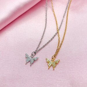 Adjustable resizable rhodium or gold plated dainty butterfly cubic zirconia cz charm necklace with stainless steel chain