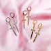 Gold, rose gold, or rhodium plated dagger sword charm earrings with gold, rose gold, or rhodium plated mini huggie hoops 