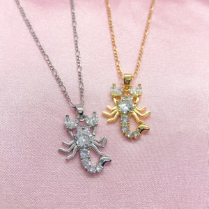 Adjustable resizable rhodium or gold plated scorpion Scorpio cubic zirconia charm necklace w/figaro style chain