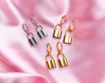 Stainless steel lock charm earrings with rhodium, rose gold, or gold plated mini huggie hoops