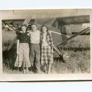 A girl on each arm, vintage snapshot photo