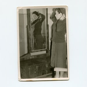 Adjusting her baret, vintage snapshot photo