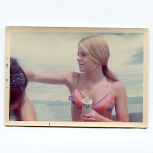 Coppertone, vintage snapshot photo