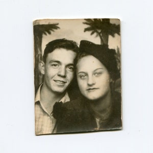 Young couple, vintage photo booth photo