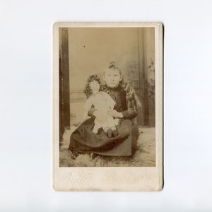 Photographed on the floor, antique cabinet card photo