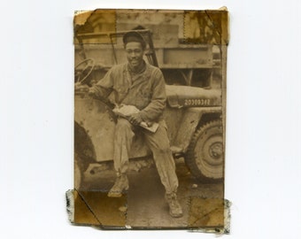 Man in uniform, vintage African American snapshot photo