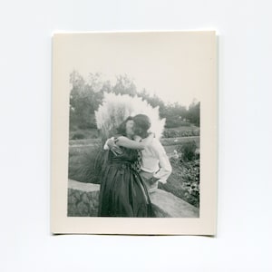 The kiss, vintage snapshot photo
