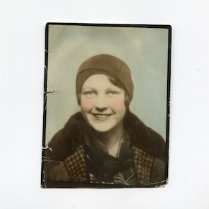 Hand tinted, vintage photo booth photo