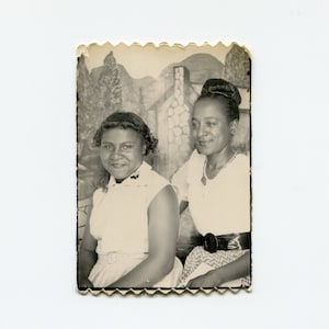 Mother and daughter, vintage African American photo booth photo