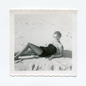 Posed on the sand, vintage snapshot photo