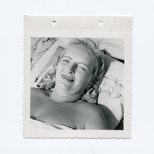 Squinting, vintage snapshot photo