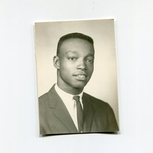 Fresh faced, vintage wallet sized African American studio photo