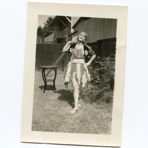 Tamborine girl, vintage snapshot photo