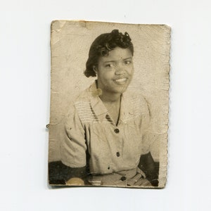 Well loved, vintage African American studio photo
