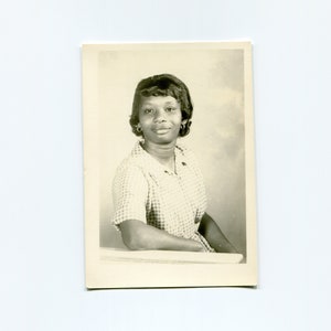She looks sweet, vintage African American studio photo