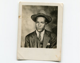 Serious, vintage African American studio photo