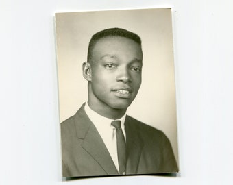 Fresh faced, vintage wallet sized African American studio photo