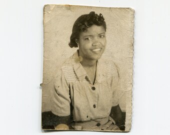 Well loved, vintage African American studio photo