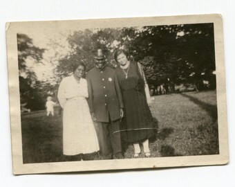 Policeman, antique snapshot photo, African American family
