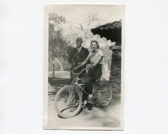 A bike and a camera, vintage snapshot photo