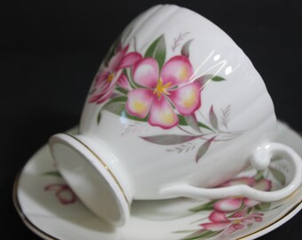 Vintage Consort Bone China Teacup and Saucer: Pink Floral Design