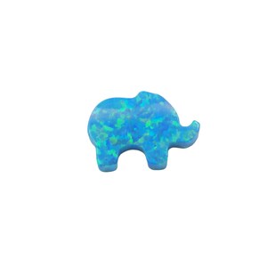 May include: A blue opal elephant charm with a light blue and green iridescent finish.