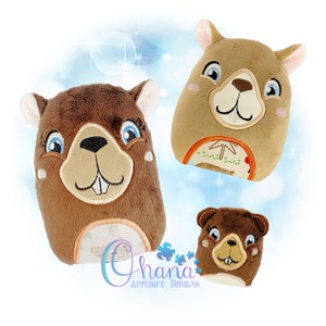 May include: Three plush brown beaver toys with embroidered faces. The largest beaver is sitting upright with its mouth open, the middle beaver is lying down, and the smallest beaver is standing upright.