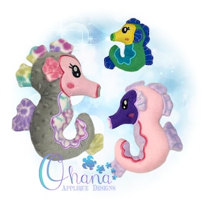 May include: Three plush seahorse toys. One is gray with purple and pink accents, one is pink with purple accents, and one is green with yellow accents.