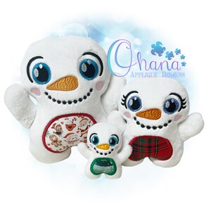 May include: Three plush snowman toys with embroidered faces and different colored accents. The largest snowman has a red and white patterned fabric on its belly, the middle snowman has a red and black plaid fabric on its belly, and the smallest snowman has a green and white patterned fabric on its belly. The text "Ghana Applique Designs" is visible in the background.