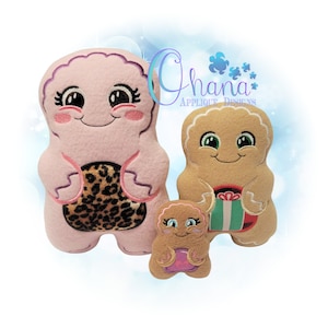 May include: Three plush toys in different sizes. The largest is pink with a leopard print spot, the middle is brown with a green and white gift, and the smallest is brown with a pink heart. All three have embroidered faces with big eyes and smiles.