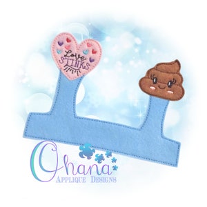 May include: A blue felt headband with a pink heart that says "Love Stinks" and a brown poop emoji with a smiley face.