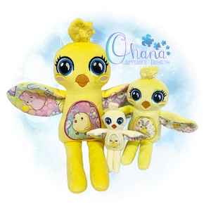 May include: Three yellow plush chick toys with embroidered eyes and beaks. The largest chick has wings with a pink and white floral pattern. The middle chick has a smaller wing and the smallest chick has no wings. The text "Ohana Applique Designs" is visible in the background.